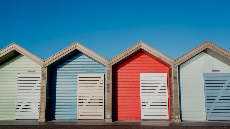 Blyth Beach huts on the wider estate walk near Seaton Delaval Hall Northumberland